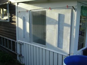 Solskyddsluckor på verandan